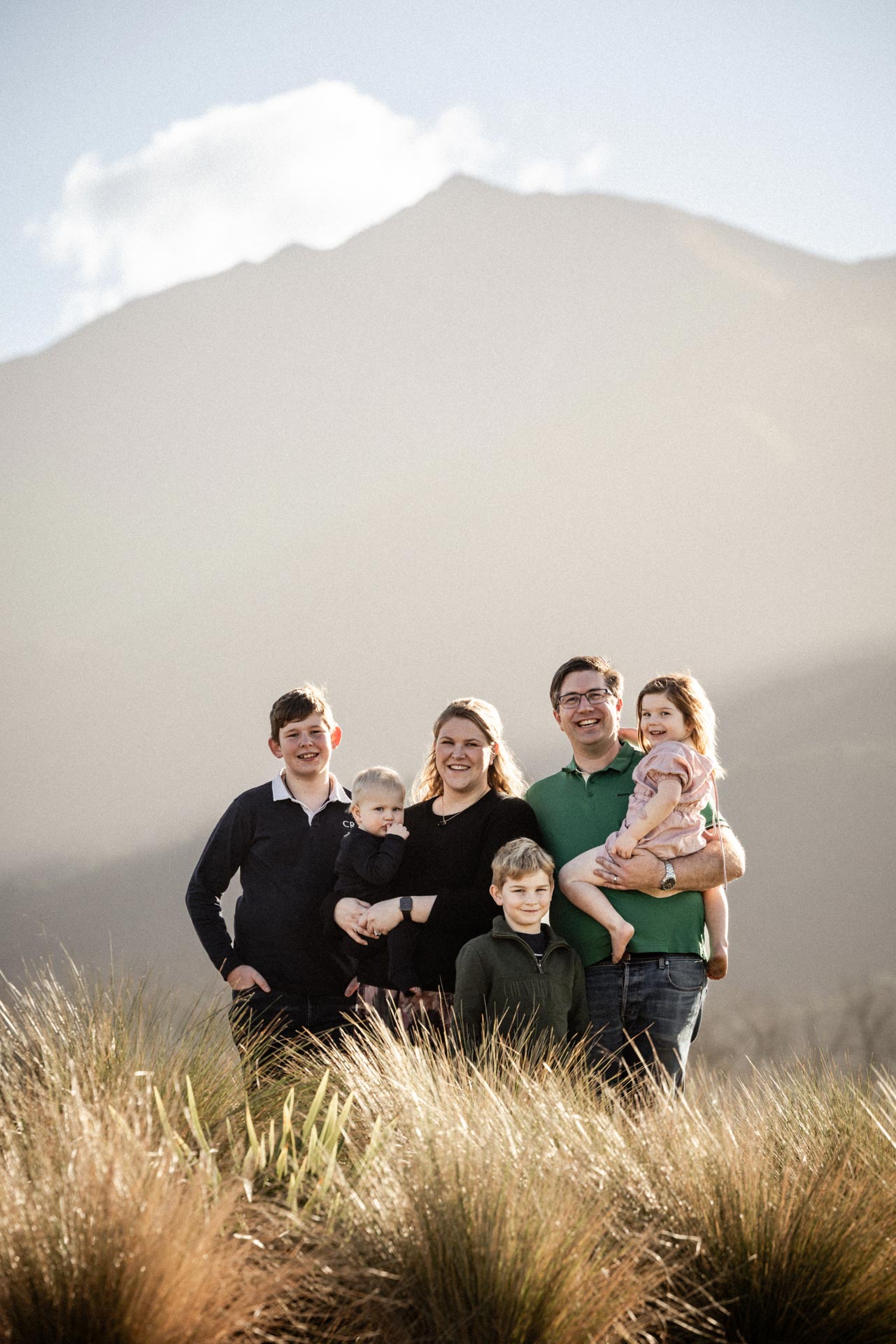 Family portrait in the tussocks with Mt Peel beyond